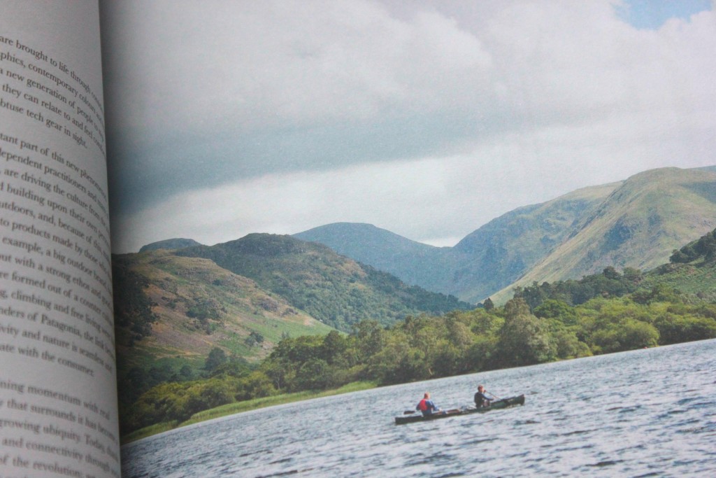 People rowing boat infront of hills in Another Escape magazine
