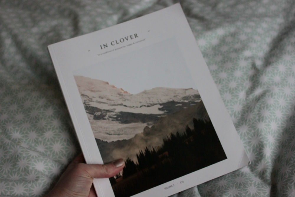 In Clover magazine cover in hand