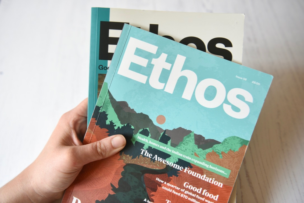 Ethos magazine issue 5 and 6 closed and held in hand